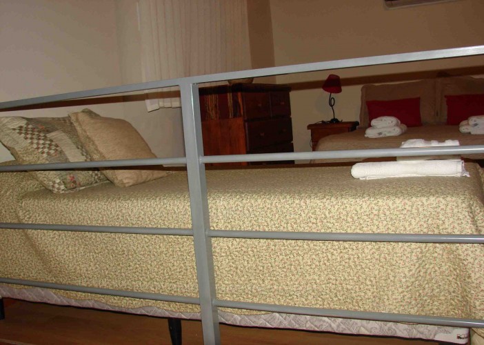 img/inmuebles/camas_arriba.jpg
